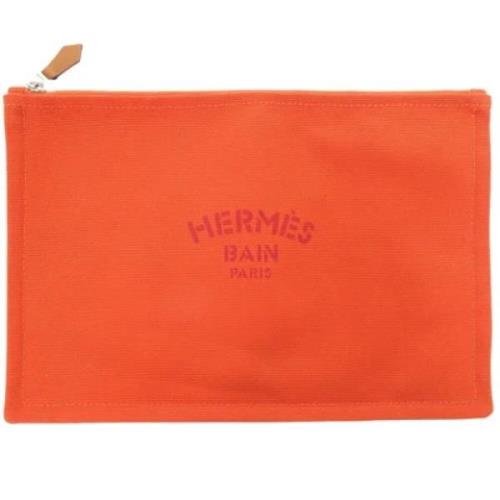 Pre-owned Cotton pouches Hermès Vintage , Orange , Dames