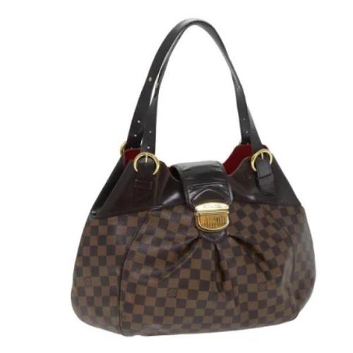 Pre-owned Canvas handbags Louis Vuitton Vintage , Brown , Dames