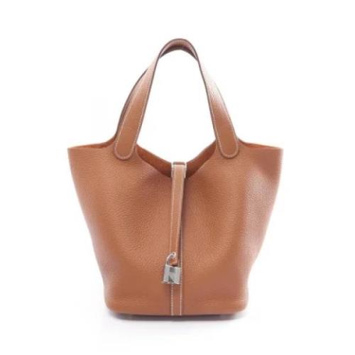 Pre-owned Leather handbags Hermès Vintage , Brown , Dames