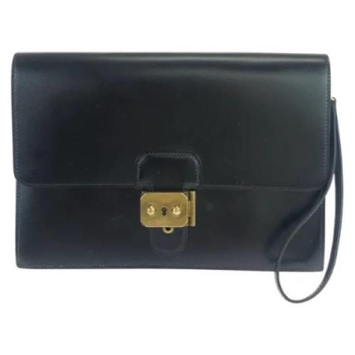 Pre-owned Leather clutches Hermès Vintage , Black , Dames