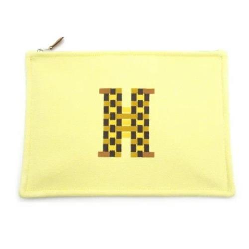 Pre-owned Canvas pouches Hermès Vintage , Yellow , Dames