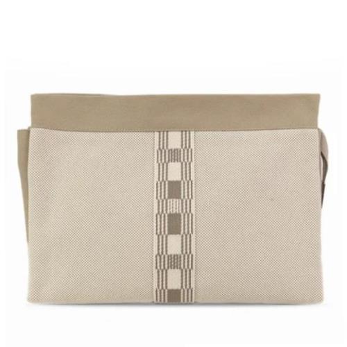 Pre-owned Canvas clutches Hermès Vintage , Beige , Dames