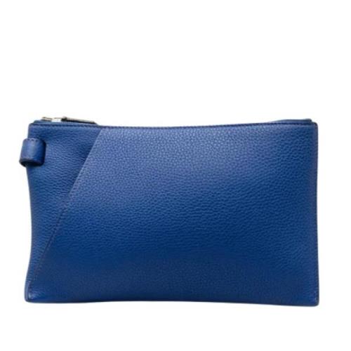 Pre-owned Leather clutches Hermès Vintage , Blue , Dames