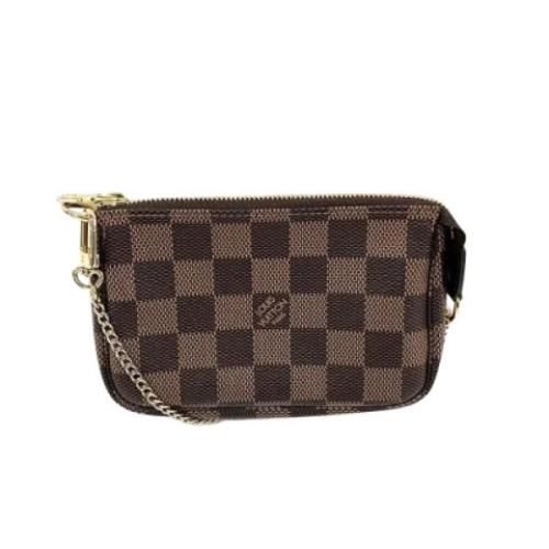 Pre-owned Canvas clutches Louis Vuitton Vintage , Brown , Dames