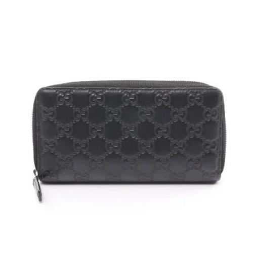 Pre-owned Leather wallets Gucci Vintage , Black , Dames