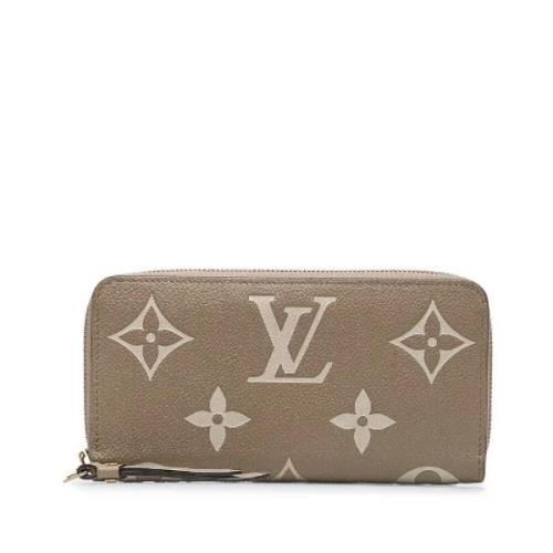 Pre-owned Leather wallets Louis Vuitton Vintage , Beige , Dames