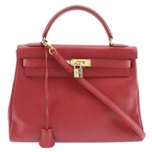 Pre-owned Leather handbags Hermès Vintage , Red , Dames