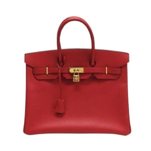 Pre-owned Leather handbags Hermès Vintage , Red , Dames