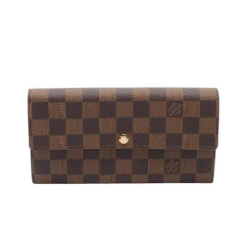 Pre-owned Leather wallets Louis Vuitton Vintage , Brown , Dames