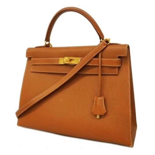 Pre-owned Leather handbags Hermès Vintage , Brown , Dames