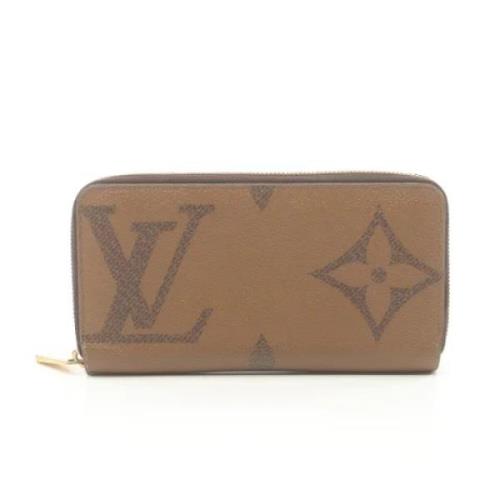 Pre-owned Leather wallets Louis Vuitton Vintage , Brown , Dames