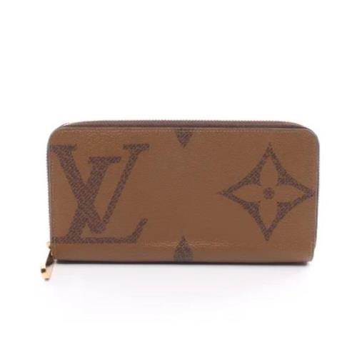 Pre-owned Leather wallets Louis Vuitton Vintage , Brown , Dames