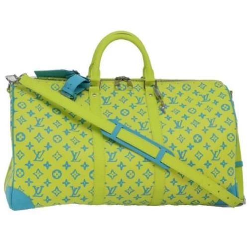 Pre-owned Canvas travel-bags Louis Vuitton Vintage , Yellow , Dames