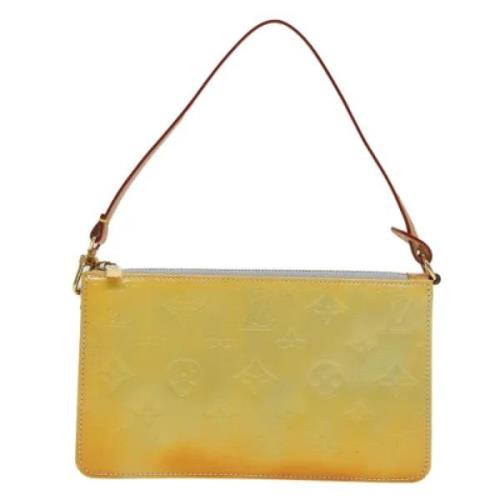 Pre-owned Leather clutches Louis Vuitton Vintage , Yellow , Dames