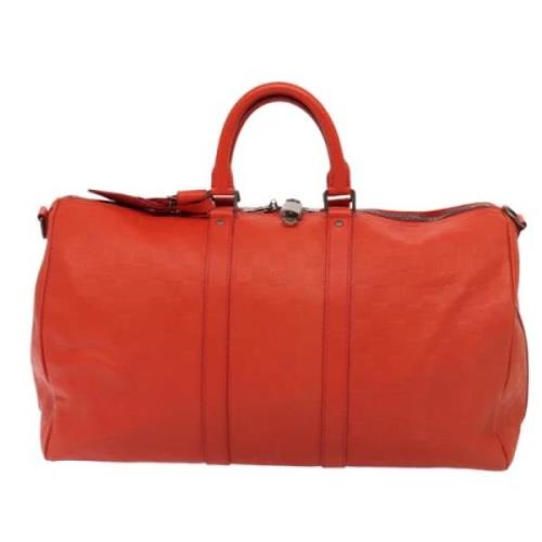 Pre-owned Leather travel-bags Louis Vuitton Vintage , Red , Dames