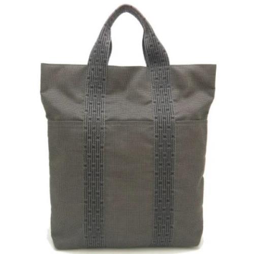 Pre-owned Nylon totes Hermès Vintage , Gray , Dames