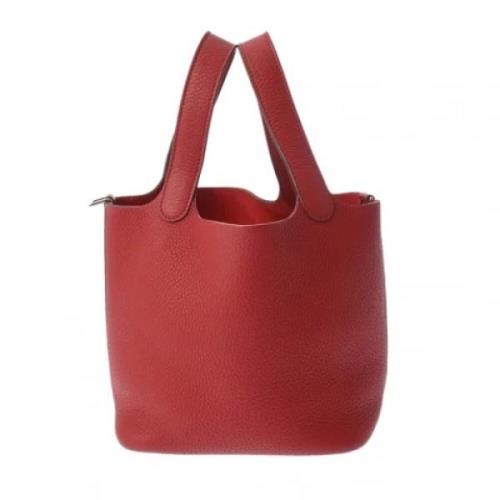 Pre-owned Leather handbags Hermès Vintage , Red , Dames