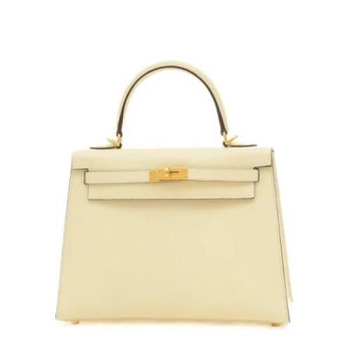 Pre-owned Leather handbags Hermès Vintage , Beige , Dames