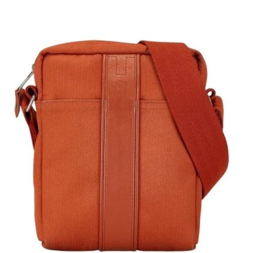 Pre-owned Canvas shoulder-bags Hermès Vintage , Orange , Dames