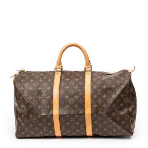 Pre-owned Canvas travel-bags Louis Vuitton Vintage , Brown , Dames