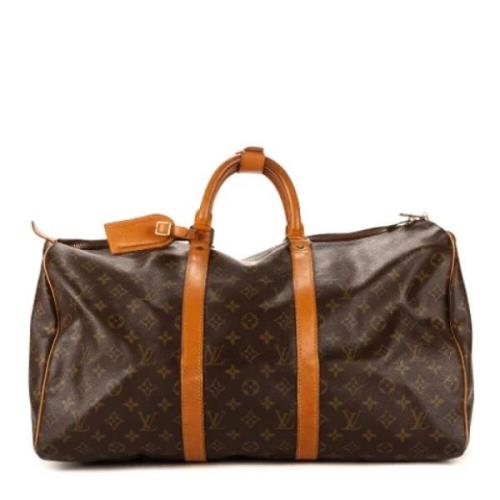 Pre-owned Coated canvas handbags Louis Vuitton Vintage , Brown , Dames