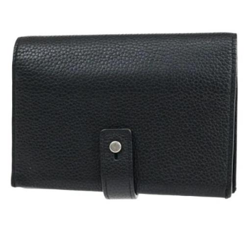 Pre-owned Leather wallets Yves Saint Laurent Vintage , Black , Dames