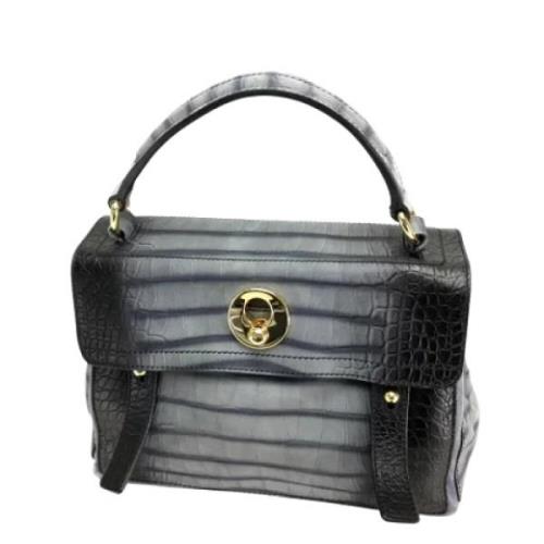 Pre-owned Leather handbags Yves Saint Laurent Vintage , Gray , Dames