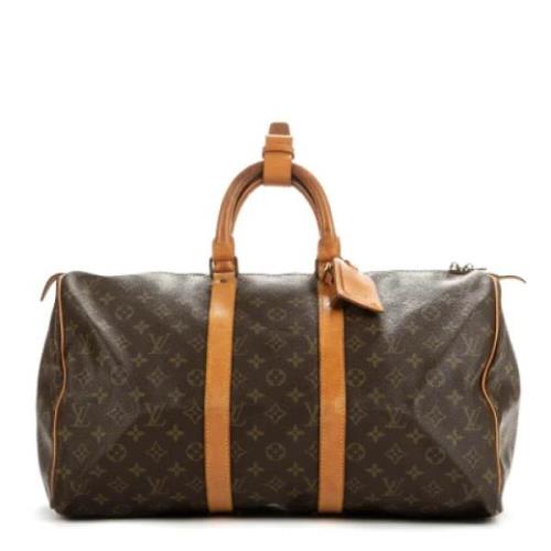 Pre-owned Coated canvas handbags Louis Vuitton Vintage , Brown , Dames