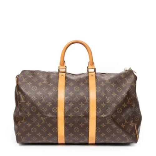 Pre-owned Coated canvas handbags Louis Vuitton Vintage , Brown , Dames