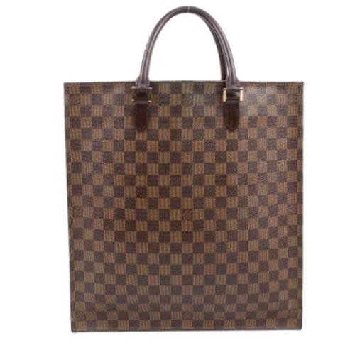 Pre-owned Leather handbags Louis Vuitton Vintage , Brown , Dames