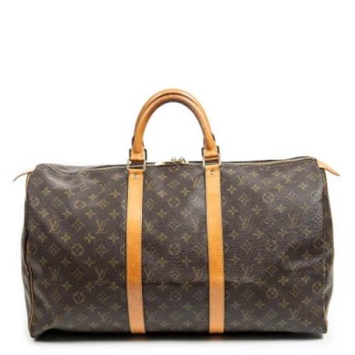 Pre-owned Coated canvas handbags Louis Vuitton Vintage , Brown , Dames