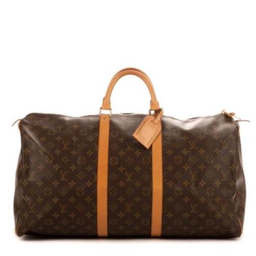 Pre-owned Coated canvas handbags Louis Vuitton Vintage , Brown , Dames