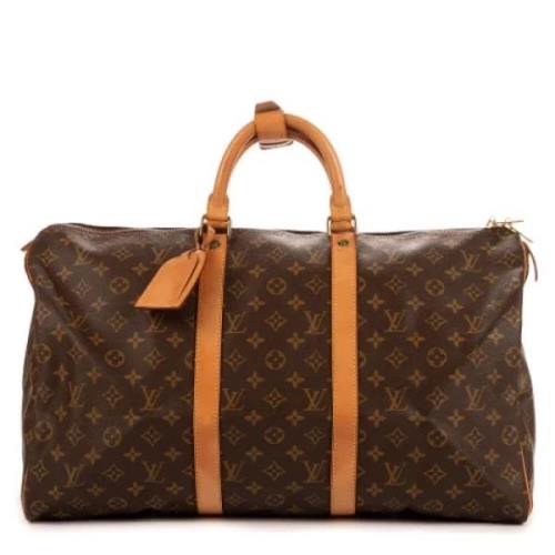 Pre-owned Coated canvas handbags Louis Vuitton Vintage , Brown , Dames