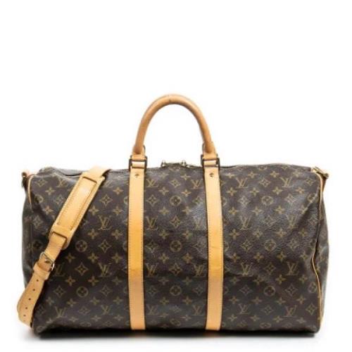 Pre-owned Coated canvas handbags Louis Vuitton Vintage , Brown , Dames