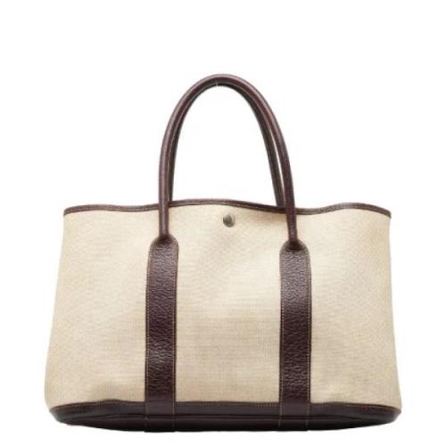 Pre-owned Canvas handbags Hermès Vintage , Beige , Dames