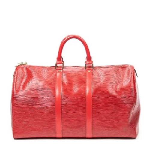 Pre-owned Leather handbags Louis Vuitton Vintage , Red , Dames