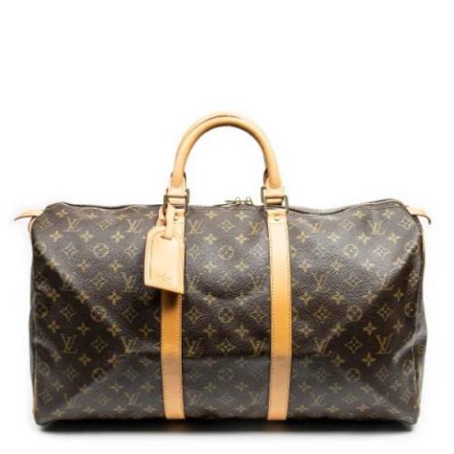 Pre-owned Coated canvas handbags Louis Vuitton Vintage , Brown , Dames