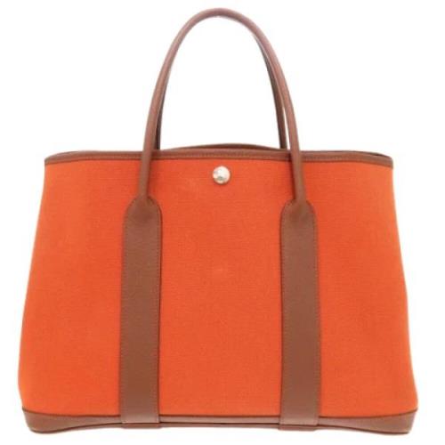 Pre-owned Leather shoulder-bags Hermès Vintage , Orange , Dames