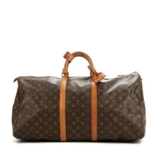 Pre-owned Coated canvas handbags Louis Vuitton Vintage , Brown , Dames