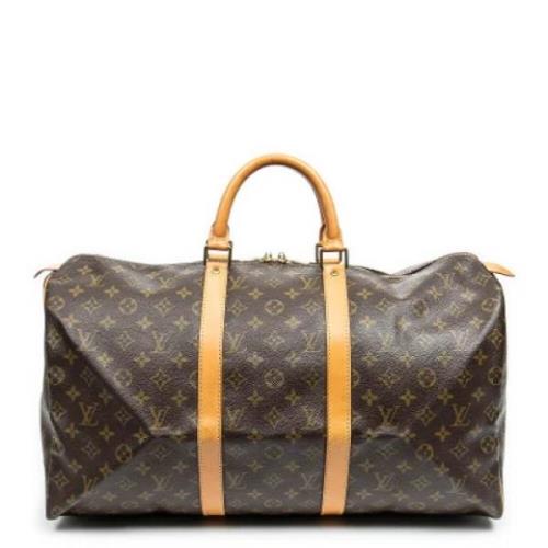 Pre-owned Coated canvas handbags Louis Vuitton Vintage , Brown , Dames