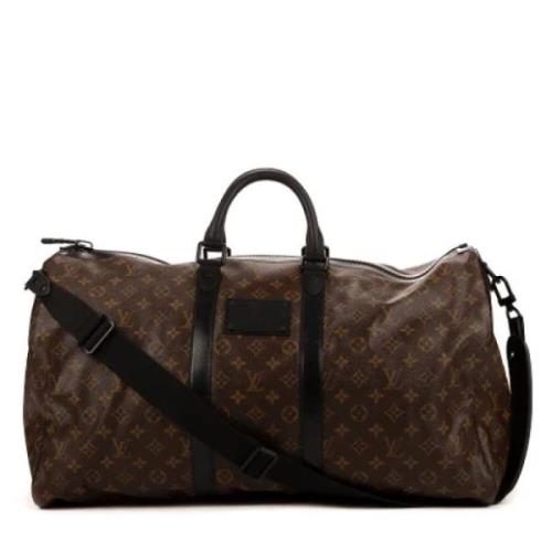 Pre-owned Coated canvas handbags Louis Vuitton Vintage , Brown , Dames