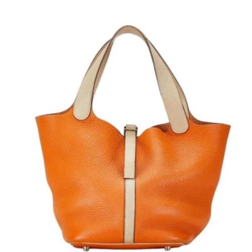 Pre-owned Leather totes Hermès Vintage , Orange , Dames