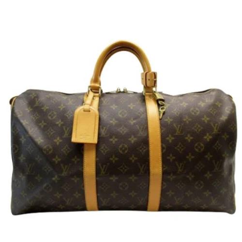 Pre-owned Canvas travel-bags Louis Vuitton Vintage , Brown , Dames