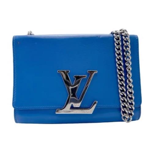 Pre-owned Leather clutches Louis Vuitton Vintage , Blue , Dames