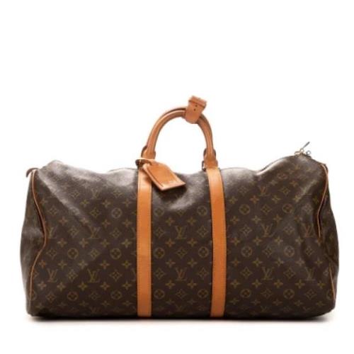 Pre-owned Coated canvas handbags Louis Vuitton Vintage , Brown , Dames