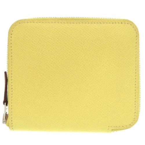 Pre-owned Leather wallets Hermès Vintage , Yellow , Dames