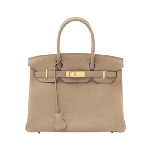 Pre-owned Leather handbags Hermès Vintage , Beige , Dames