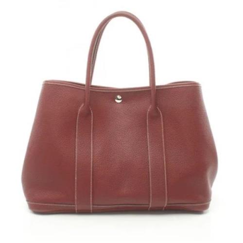 Pre-owned Leather totes Hermès Vintage , Red , Dames