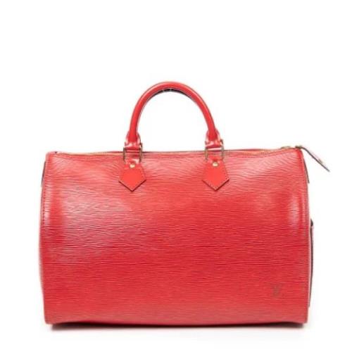 Pre-owned Leather handbags Louis Vuitton Vintage , Red , Dames