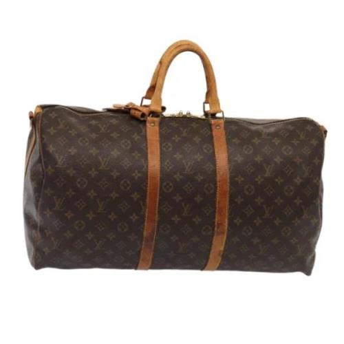 Pre-owned Canvas travel-bags Louis Vuitton Vintage , Brown , Dames